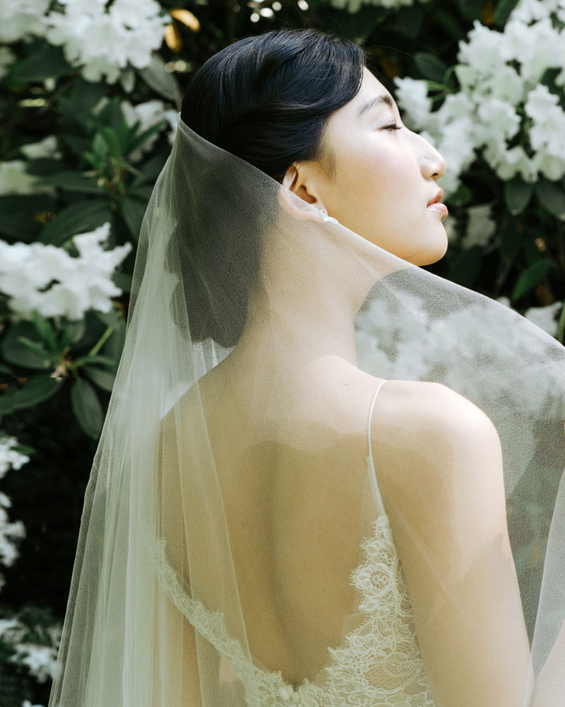 Close up of model wearing the Azalea two-layer veil without gathers.