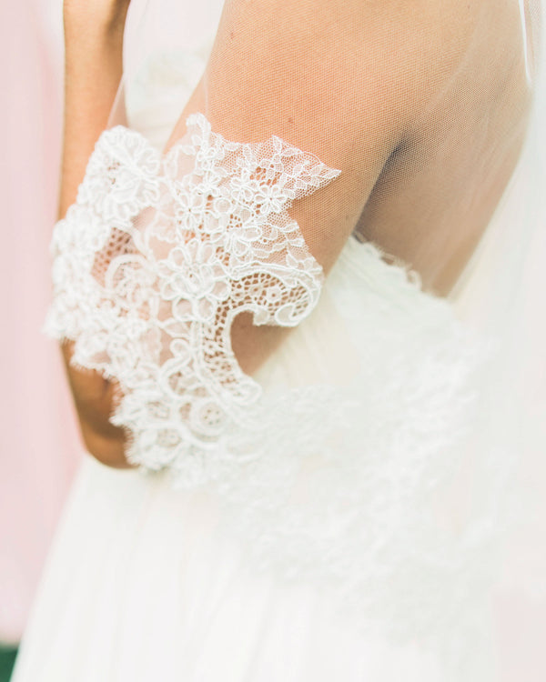 Close up of the lace edge on the waist length Delicate Chantilly Lace Veil.