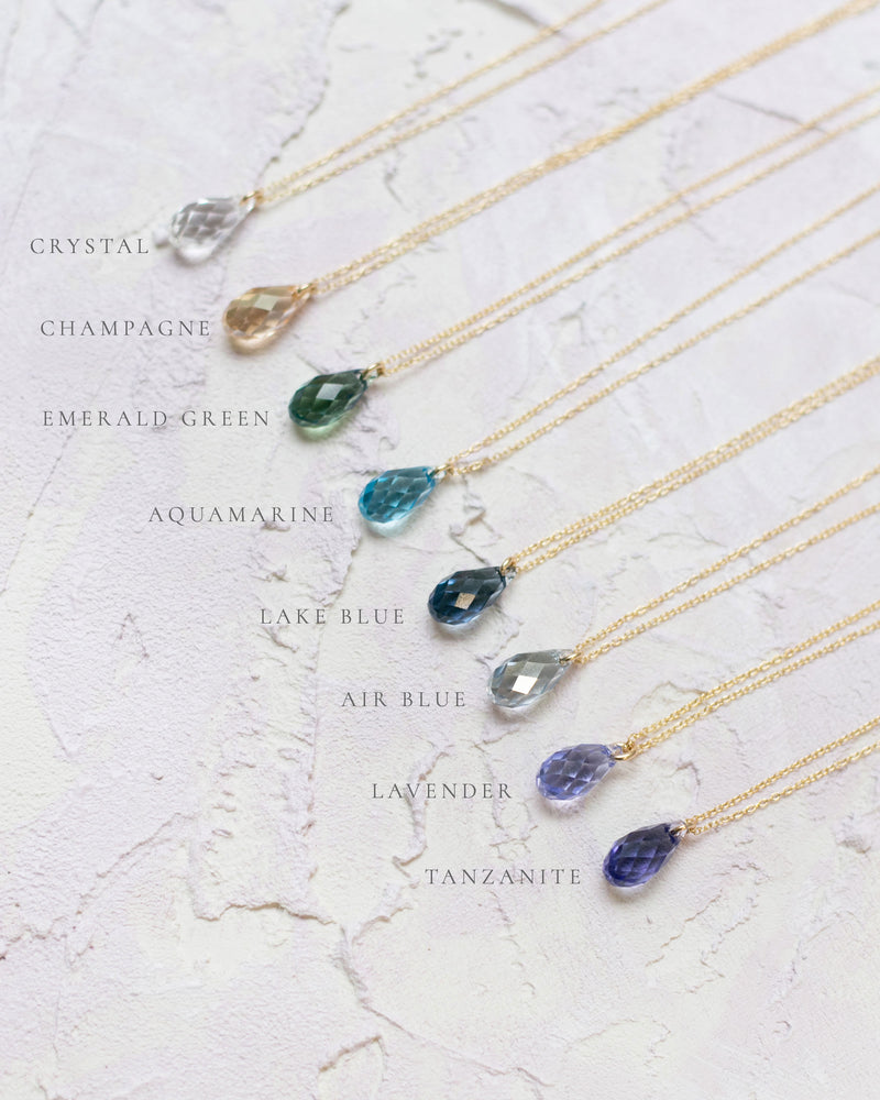Side by side comparison of the 8 crystals that the Dewdrop Earrings are available in.