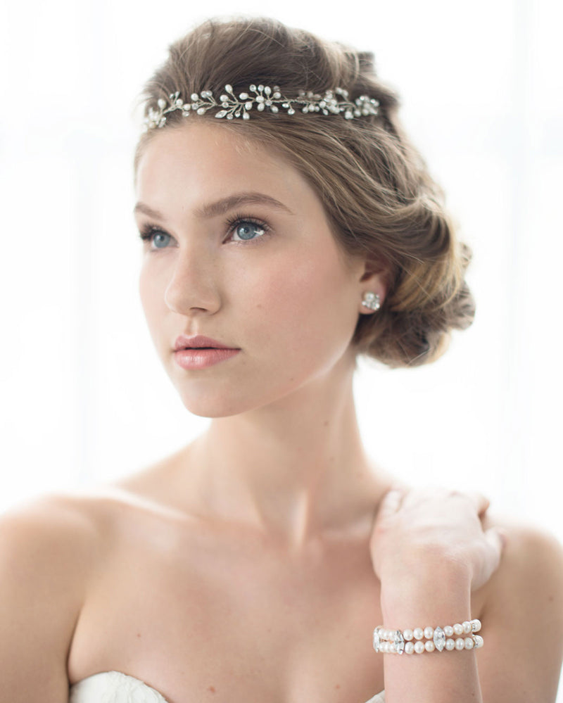 A bride wears the Midnight Garden Pearl Bracelet in silver; two strands of freshwater pearls with marquise crystals.
