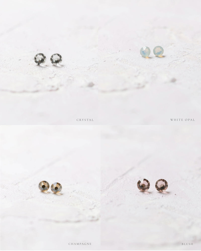Close product view of the Starry Eyed Stud Bridesmaid earrings in crystal, white opal, champagne, blush.