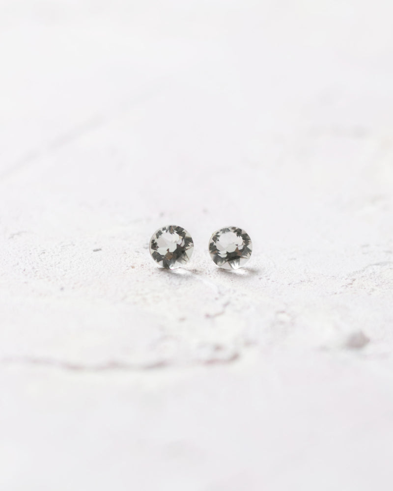 Close product view of the Starry Eyed Stud Earrings in crystal.
