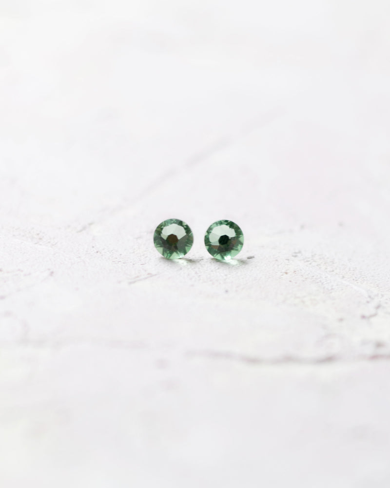 Close product view of the Starry Eyed Bridesmaid Earrings in spring green.