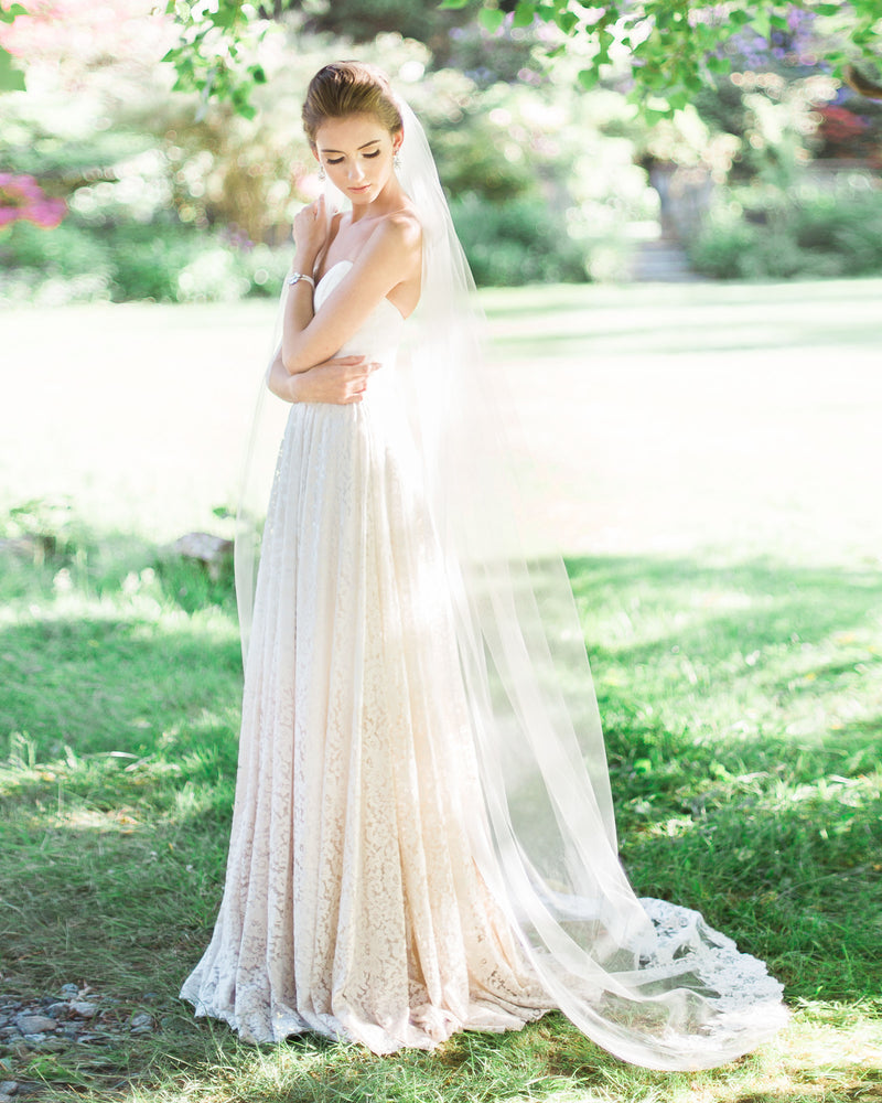 Model wearing Whispering Roses Beaded Lace long bridal Veil