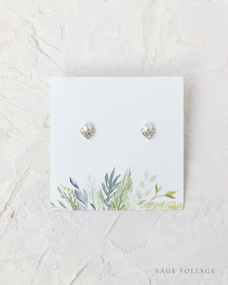 Flatlay of a custom jewelry insert option for our Luxe Gift Wrapping; sage watercolor.