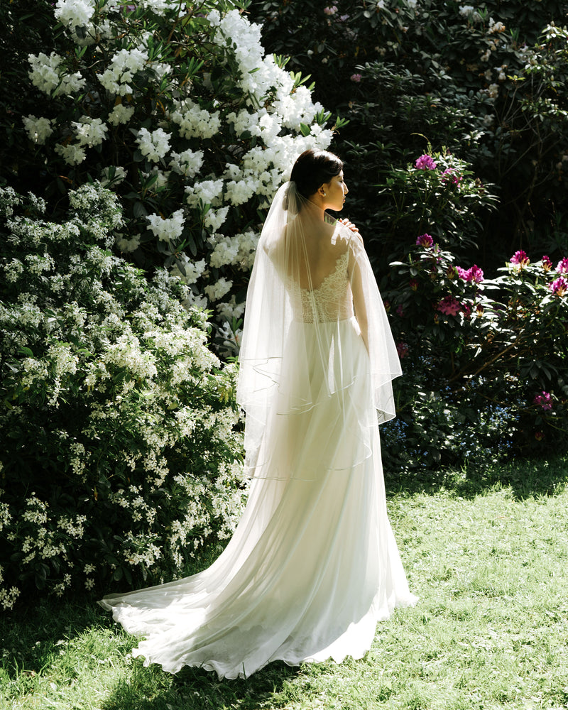 Calla bridal veil, model wearing short wedding veil