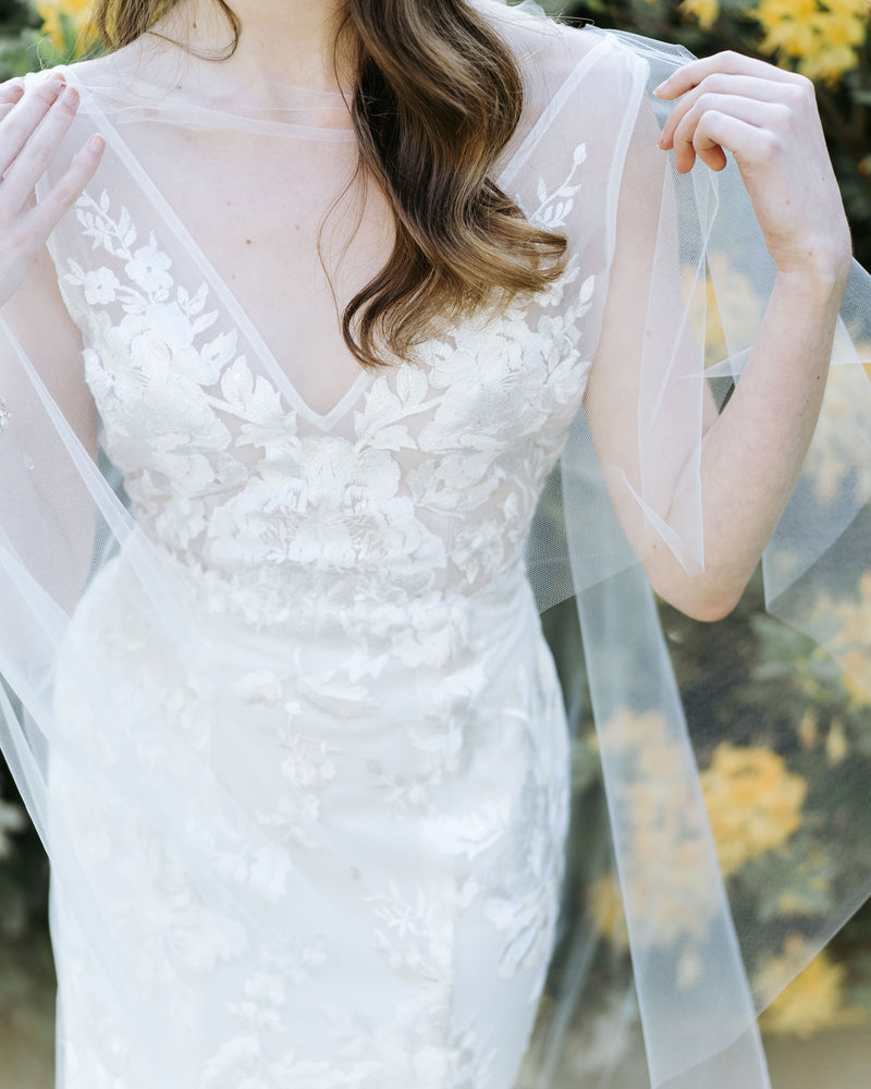 close up of cascading leaves wedding cape