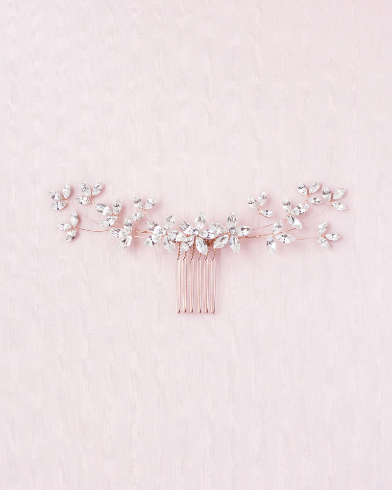 A flatlay view of the Crystal Blossoms Comb in rose gold.