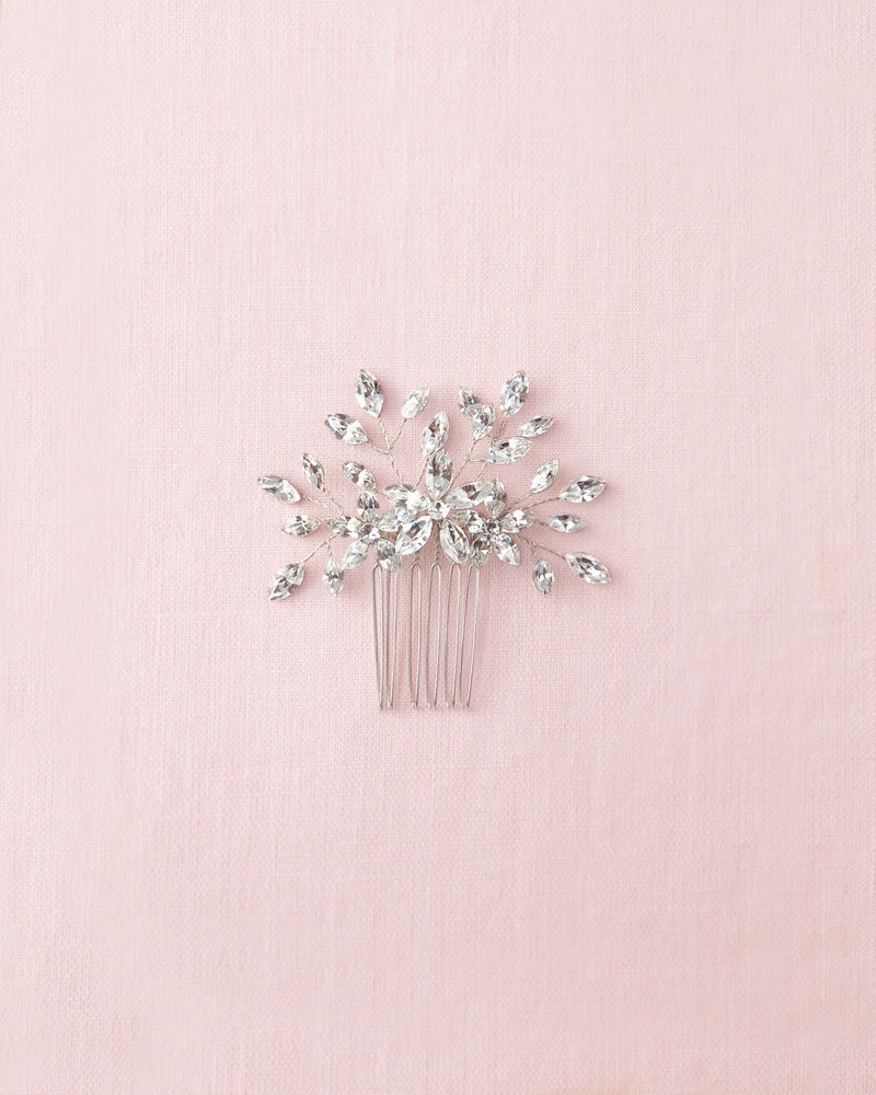 Flatlay of the Delicate Comb in all crystal and silver.