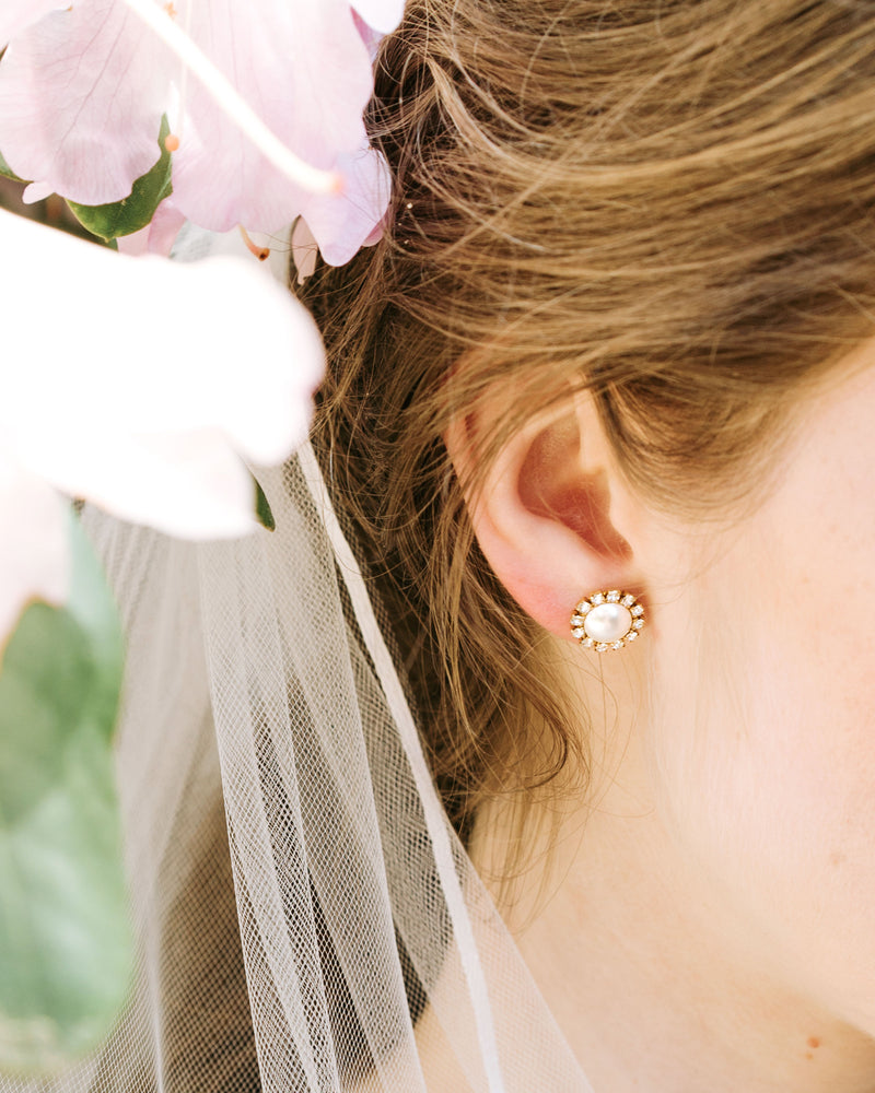 A close on model view of the Leila Veil's delicate ribbon edge.