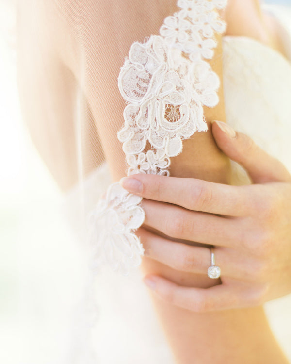 Close details of the floral lace edge on the Peony Lace Short Veil.