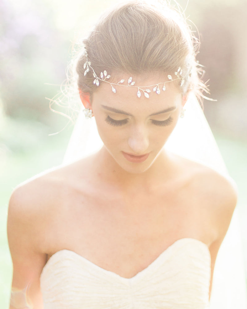 A boho bride wears the Sparkling Crystal Hair Vine in silver.
